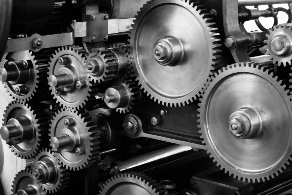 Close-up of interlocking metal gears in machinery